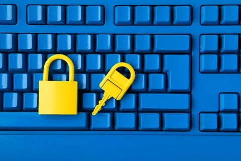 Cyber data and information security idea. Yellow padlock and key and blue k.. Stock Photos