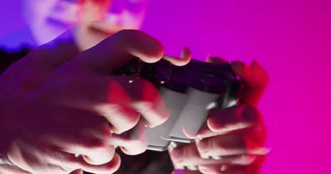 Cyber Glitch Background with a Young Man Playing on a Game Console. Stock Footage 150834996