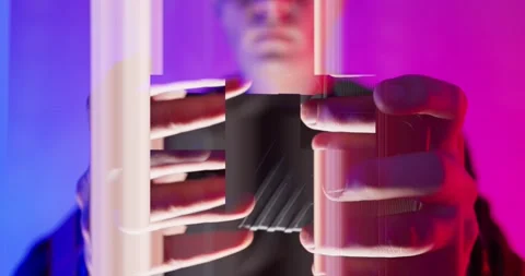 Cyber Glitch Background with a Young Man Playing on a Game Console. Stock Footage 150835116