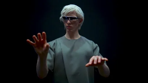 Cyber guy typing virtual reality glasses closeup. Metaverse man chatting online Stock Footage 211802364