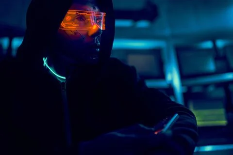 Cyber hacker breaks into databases to obtain information using a computer. 스톡 사진