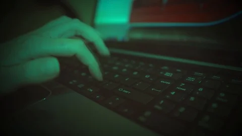 Cyber hacker using computer, keyboard with fingers. Programmer, code internet, Stock Footage 108247854