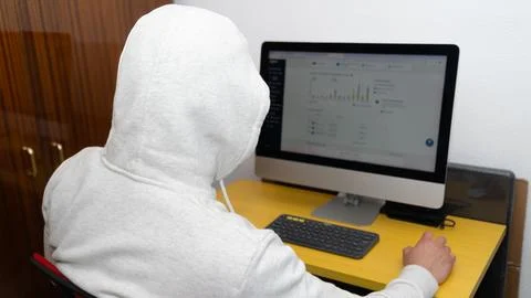 Cyber hacker violating banking security Stock Photos