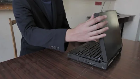 Cyber Hacker Working With Old Retro Laptop Stock Footage 283658658