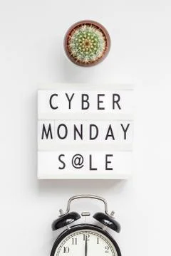 Cyber Monday sale text on white lightbox Stock Photos