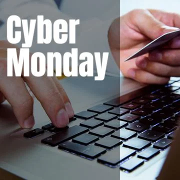 Cyber monday text over hands of caucasian man using laptop and credit card Stock-Illustration
