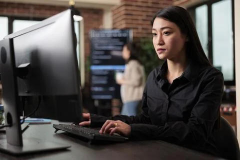 Cyber officer working with binary numbers for database application development Stock Photos