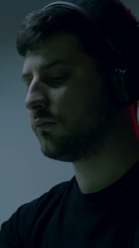 Cyber security analyst, focused on computer screen displaying data, prepares for Stock Footage 323743701