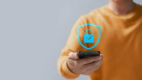 Cyber ??security and data protection, businessman using smartphone internet.. Stock Photos