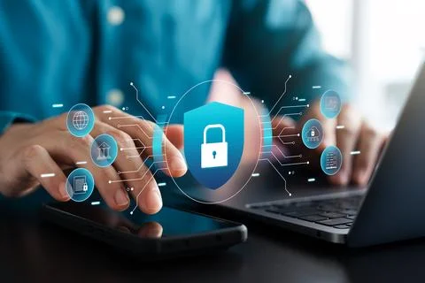 Cyber ??security and data protection, businessman using laptop and tablet I.. Stock Photos