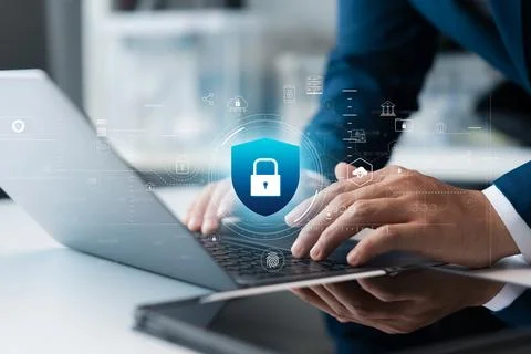 Cyber ??security and data protection, businessman using laptop and tablet I.. Stock Photos