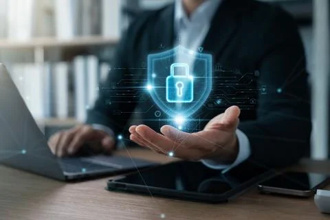 Cyber ??security and internet data protection, businessman using laptop and.. Stock Photos