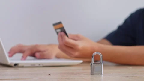 Cyber security concept blurred user making digital payment behind physical Stock Footage 328550641