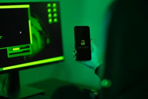 Cyber security concept showing hacker break into mobile phone Stock Photos