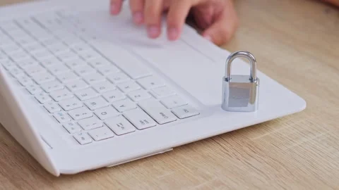 Cyber security concept silver padlock locking white computer keyboard 스톡 동영상 328550682