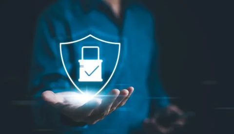 Cyber security concept with virtual lock shield. Person presenting Stock Photos