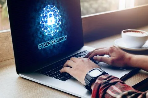 Cyber security data privacy concept with human using laptop at coffee cafe. Stock Photos