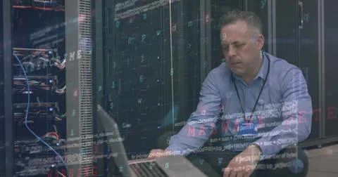 Cyber security data processing over caucasian male engineer with laptop working Stock Photos