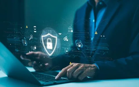 Cyber security data protection concept. Professional using a laptop Stock Photos