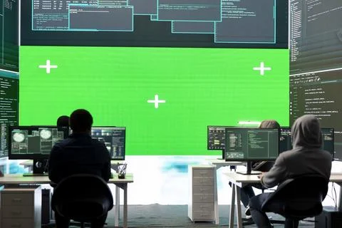 Cyber security experts working with mockup layout on a big screen Stock Photos
