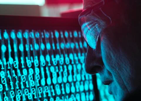 Cyber Security, Man looking at computer screen which is being infected by a Stock-Fotos