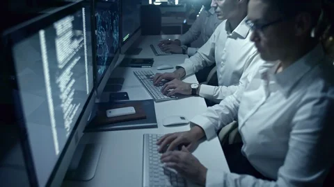 Cyber Security Professionals Working at Night 库存影片 85827099