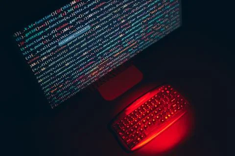 Cyber security. Program code on screen. Using computer and programming to b.. Stock Photos