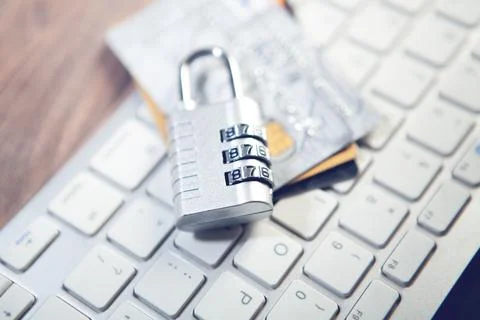 Cyber security protection concept. padlock with laptop on keyboard Stock Photos