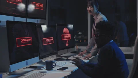 Cyber Security Specialists Fixing Error Stock Footage 171065925