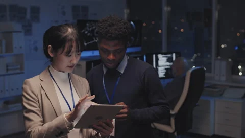 Cyber Security Specialists Using Tablet Stock Footage 171062028