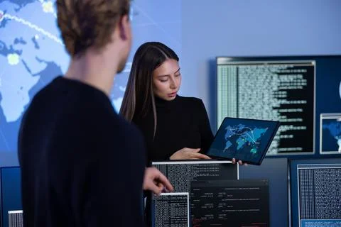 Cyber security team working in a Cyber Security Operations Center SOC to protect Stock Photos