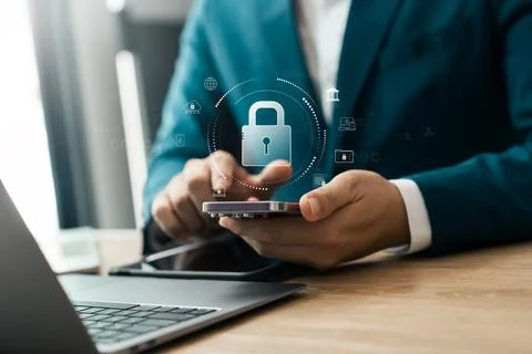Cyber ??security technology, data protection, businessman using mobile phon.. Stock Photos