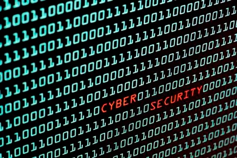 Cyber Security text and binary code concept from the desktop screen, selectiv Stock Photos