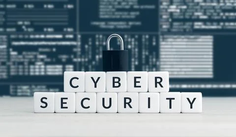 Cyber security words on blocks, closed padlock and computer data Stock Photos
