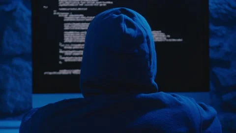 Cyber Stealth: Hooded Hacker at Work Stock Footage 270171579