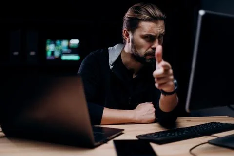 Cyber terrorist with computers at room Stock Photos