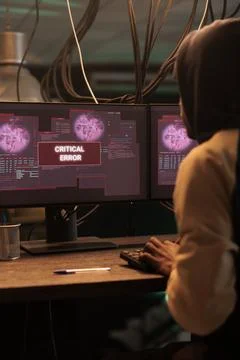 Cyberattack warning on computer screen, hacker stealing data Stock Photos
