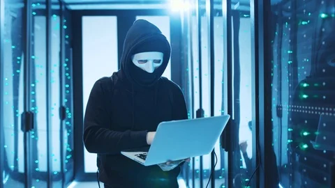 Cybercrime. Dangerous hacker coding on spyware laptop program, causing data Stock Footage 120695147