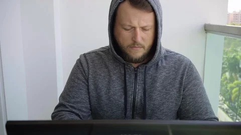 Cybercrime, hacking and technology concept - male hacker writing code or using Stock Footage 103275172