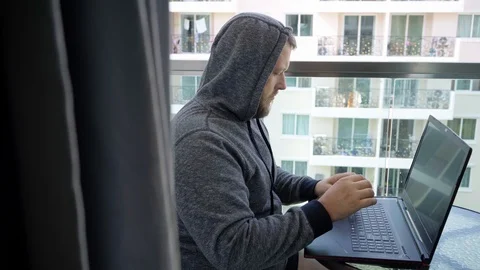 Cybercrime, hacking and technology concept - male hacker writing code or using 스톡 동영상 103275321