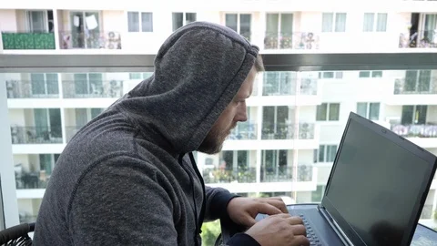Cybercrime, hacking and technology concept - male hacker writing code or using 스톡 동영상 103275376