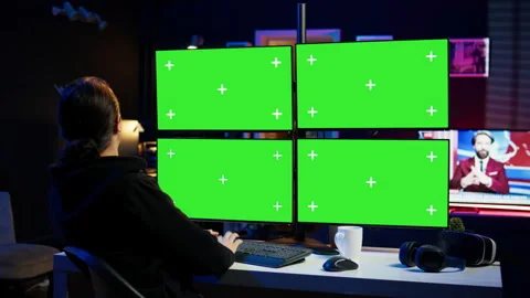 Cybercriminal coding on green screen monitors, developing zero day exploit Stock Footage 275862615