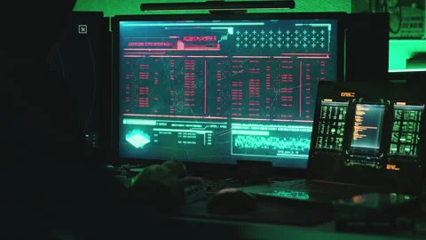 Cybercriminal conducting a malware attack on a corporate database system 스톡 동영상 336396850