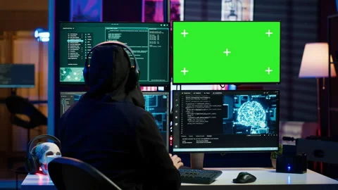 Cybercriminal using AI and isolated screen PC to develop system exploits Stock Footage 275864816