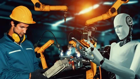 Cybernated industry robot and human worker working together in future factory Stock Footage 220165581