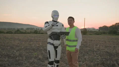 Cybernetic AI robot prototype using tablet computer with asian engineer Stock Footage 162979354
