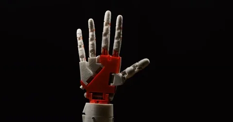 Cybernetic robot arm. Close up of the robot hand's on black background Stock-Footage 85337203