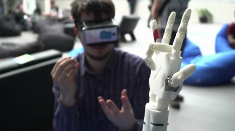 Cybernetic robot arm, which controls the people. Stock Footage 61878550