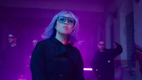 Cyberpunk: Asian model dancing at a shady lost place in front of a crowd 動画素材 280440993