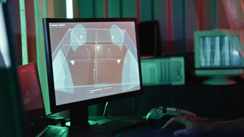 Cyberpunk hacker disabling surveillance system on compute Stock Footage 341660401